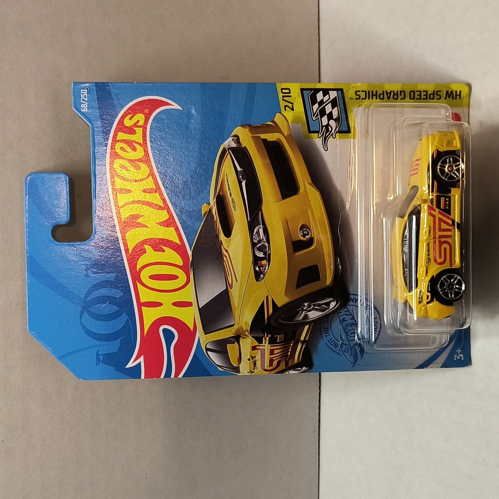 D2  Hot Wheels Subaru WRX STI  yellow shipping protector